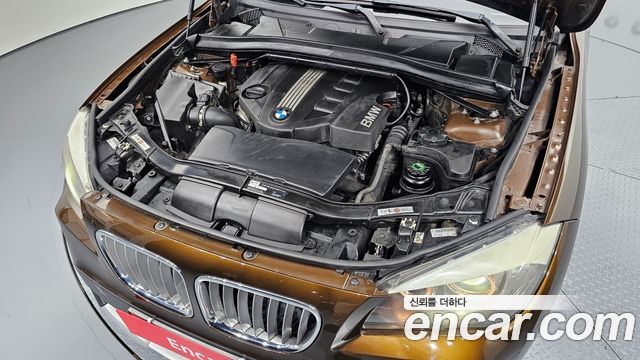 BMW X1 xDrive 23d 2010 thumbnail 6